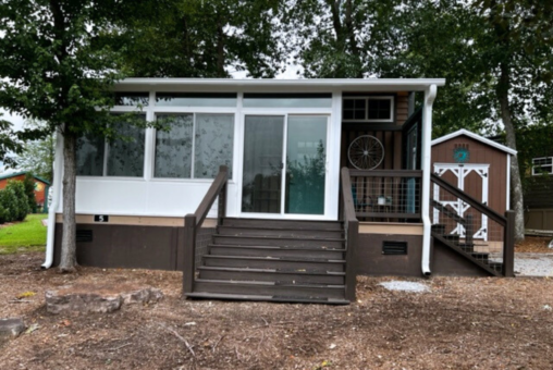 Tiny home exterior with enclosed front porch.