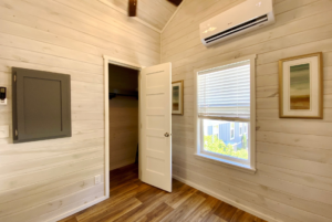 Tiny house bedroom with high ceilling and ceilling fan