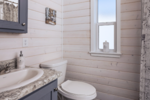 Zion tiny home bathroom with frosted window.