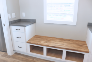 Bedroom built-in reading bench and storage drawers.