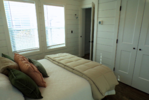 bedroom in tiny house with closet