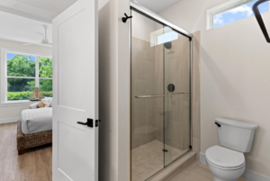 Bathroom in cottage home with walk in shower in secondary suite.