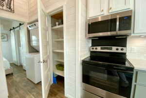 Tiny home kitchen with full size oven.