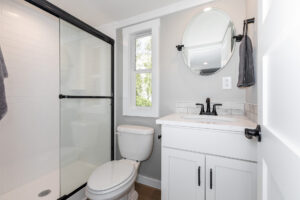 Tannehill bathroom with walk in shower and storage