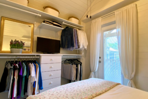 Storage in tiny home bedroom