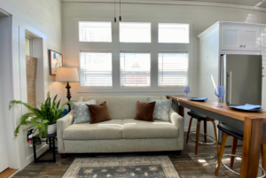 Large living room with plenty of natural light and window