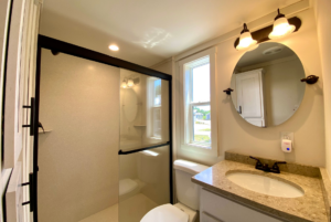 Bathroom in tiny house with full size walk-in shower.