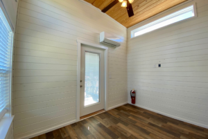 living room space in tiny home floorplan in nc