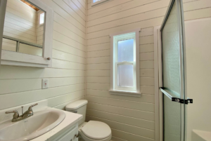 tiny home bathroom with vanity storage