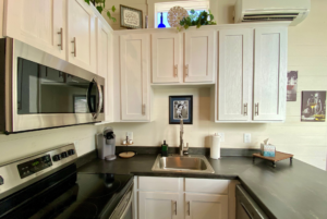 Kitchen in tiny home with full size appliances