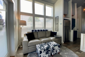 Living room with large wall full of windows