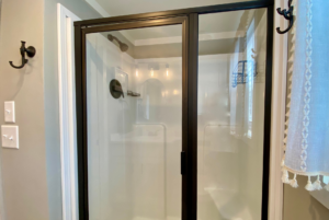 Lovely walk-in shower in this tiny house bathroom