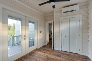 Bedroom storage and large french doors.