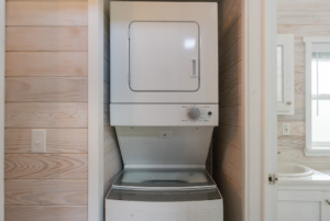 Included with the home comes a stackable washer/dryer.