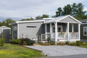 Tiny home with large driveway able to accomodate 2 cars.