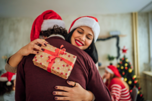 neighbors sharing holiday cheers with treats