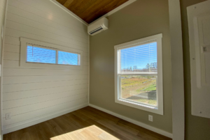 Bedroom with large windows and plenty of natural light