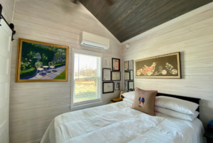 bedroom with high ceilling and plenty of natural light