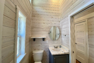 Bathroom with large window and plenty of natural light