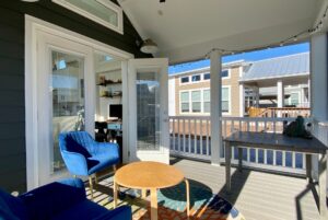 Front porch of tiny home. Screened in and covered.