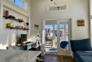 Tiny home living space withaccess to front porch