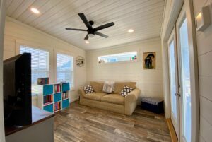 Second bedroom addition with ceilling fan and plenty of natural light