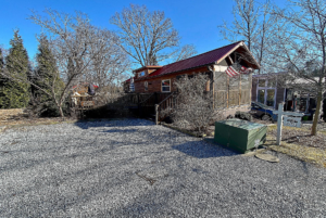 View of driveway and tiny home