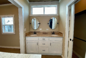 Double sink vanity with under sink storage