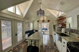 Inside tiny home view from the kitchen with floating island