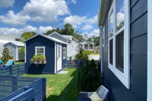 side of tiny home and shed