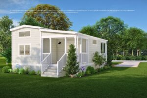 A small, modern white house with a porch, surrounded by green grass, trees, and a concrete driveway.