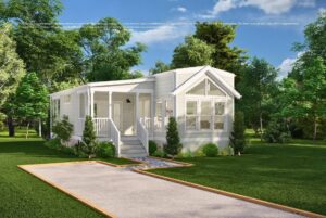 A small white cottage with a porch and garden, surrounded by trees and greenery on a sunny day.